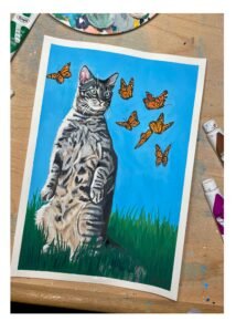 Creative art of a kitty mesmerized by butterflies, art by Meelena Spikes.